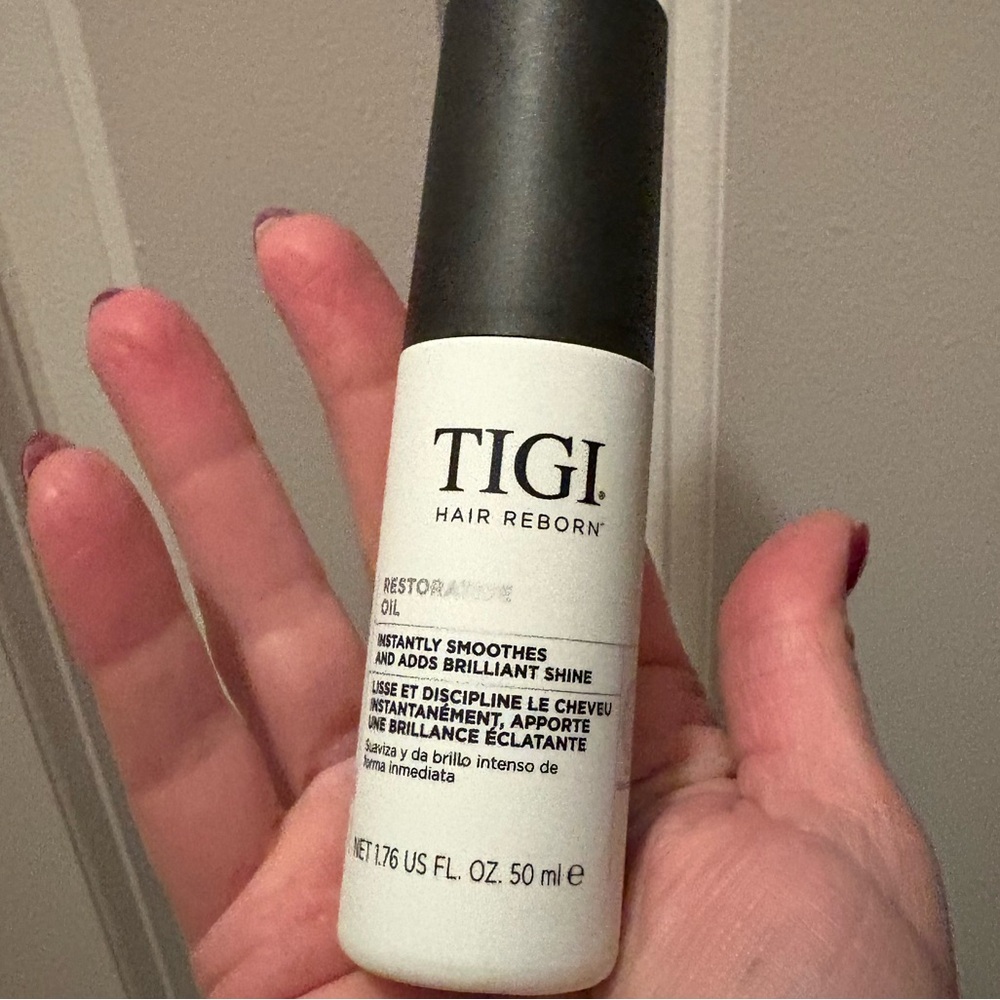 TIGI Hair Reborn Restorative Oil - Black and White Bottle